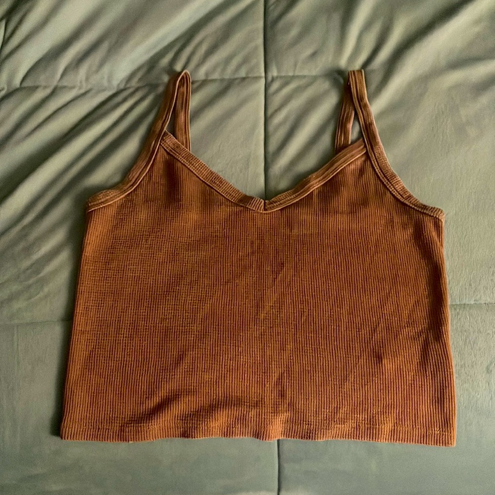This is a brown tank top in the size medium